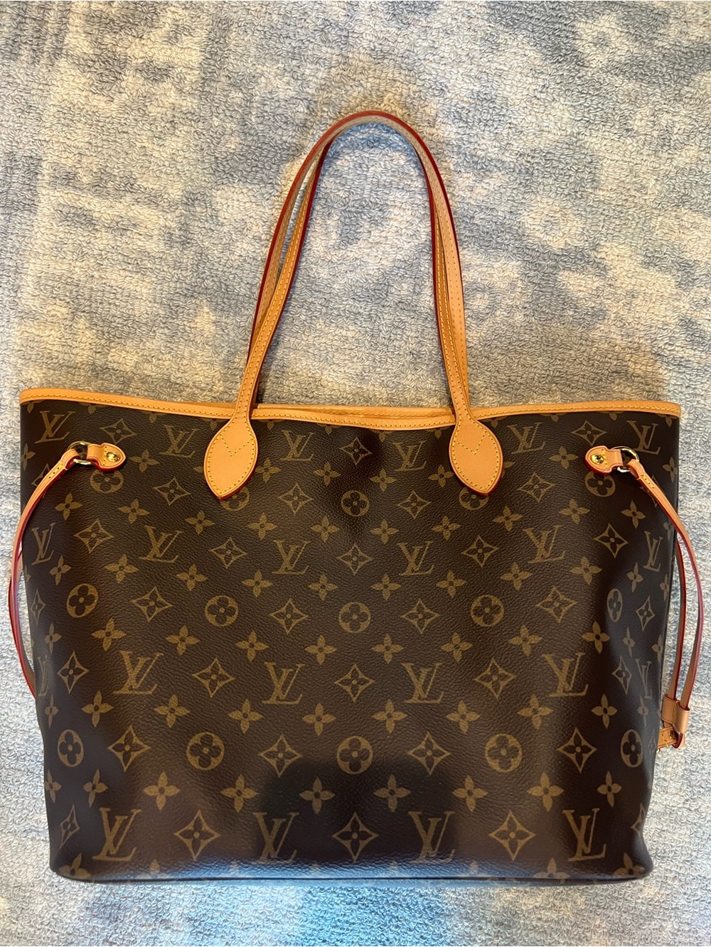 Brown Monogram Tote with vachetta trims yellow interior in excellent condition